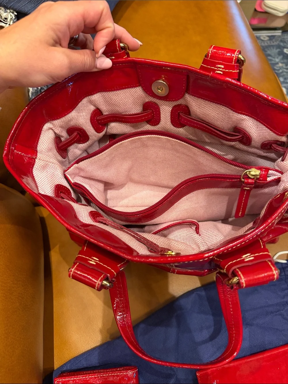 Dooney & Bourke Shiny Red Patent Leather Shoulder Bag with Buckle Straps